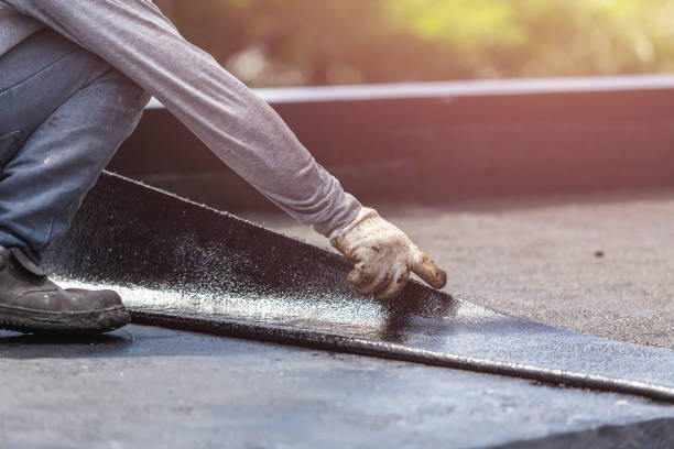 Professional Emergency Waterproofing technician working in Wheaton, IL